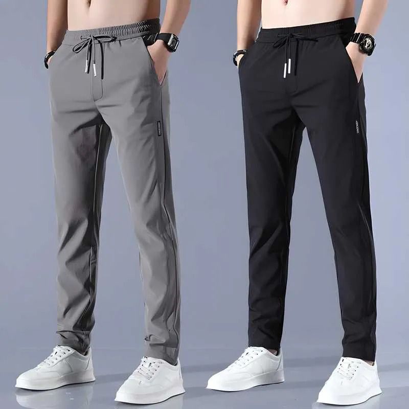 (Buy 1 Get 1 Free) Premium Men's High Stretch Skinny Lycra Pants (Black   Grey)